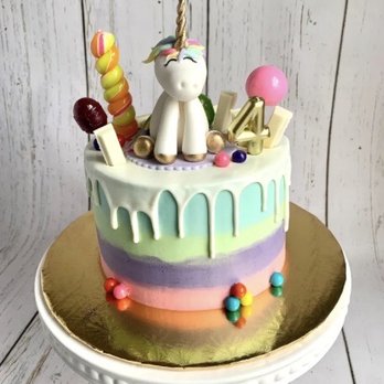 Sweets by Sheryll - a cake with a unicorn on top - Cupcakes Near Me Sweets by Sheryll - a cake with a unicorn on top - Cupcakes Near Me