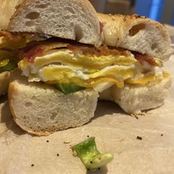 Hopewell Hot Bagels - Eggs Meat and Cheese Sandwich $4.95 Add Peppers +$0.35 Add Onions +$0.35