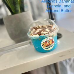 TNT Smoothie & Juice Bar - Picture is: Blue Dream Base with Bananas, Almonds, Granola, and Almond Butter. Smackin !