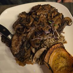 Table 105 - Prime rib with mushrooms and onions with squash.