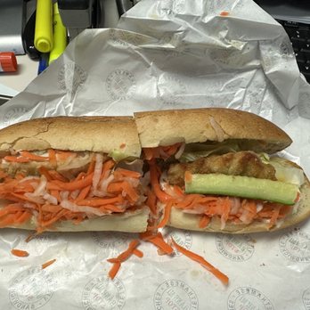 Banh Mi Stop - Crispy Chicken Banh Mi Sandwich (I did inspect the inside- it was well wrapped up and wasn't delivered so messy looking) - Sandwiches Near Me - Long Island City, New York
