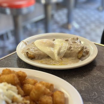 Clover Grill - Biscuit & gravy with an egg on top - Diners Near Me - New Orleans, Louisiana Clover Grill - Biscuit & gravy with an egg on top - Diners Near Me - New Orleans, Louisiana
