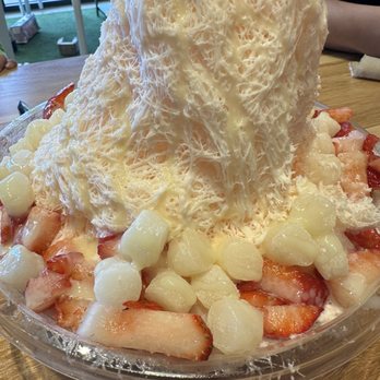 TropiTai Delights - Passion Fruit Guava Shaved Ice with condensed milk, mochi, fresh strawberries and pocky sticks - Bubble Tea Near Me - Lakewood, Colorado TropiTai Delights - Passion Fruit Guava Shaved Ice with condensed milk, mochi, fresh strawberries and pocky sticks - Bubble Tea Near Me - Lakewood, Colorado