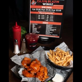 Cajun Blazin Wingz - Mango Habanero Boneless Wingz with seasoned fries and a House Punch - Chicken Wings Near Me - Slidell, Louisiana Cajun Blazin Wingz - Mango Habanero Boneless Wingz with seasoned fries and a House Punch - Chicken Wings Near Me - Slidell, Louisiana
