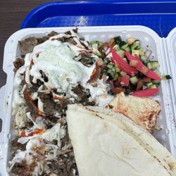 Mr Greek Donair kabab - Lamb plate with rice, salad, and humus.