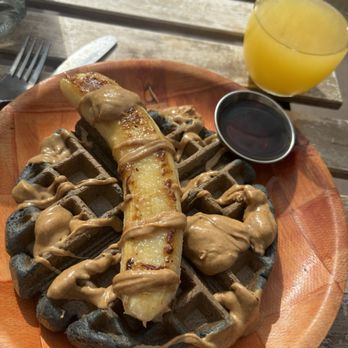 The Hidden Kitchen - Banana blue corn & peanut butter waffles- too good & mango mimosa - Juice Bars & Smoothies Near Me - Cayucos, California The Hidden Kitchen - Banana blue corn & peanut butter waffles- too good & mango mimosa - Juice Bars & Smoothies Near Me - Cayucos, California