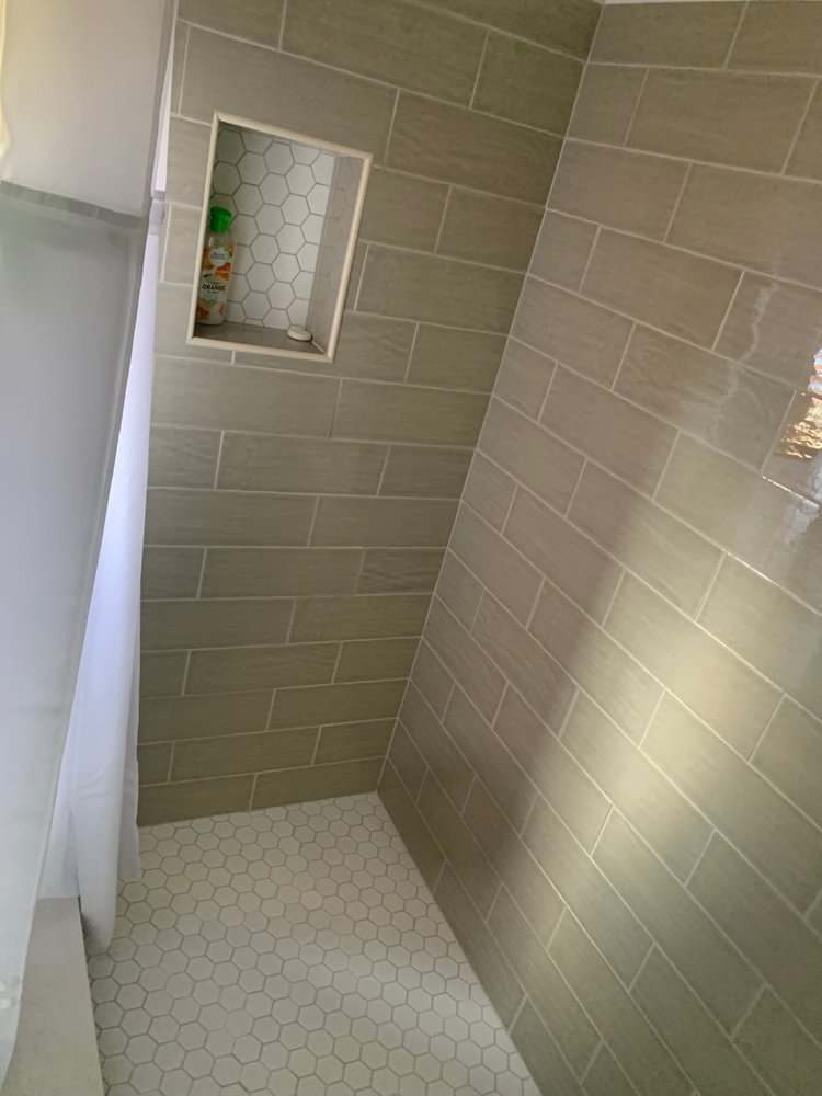 Slide of J & T Construction