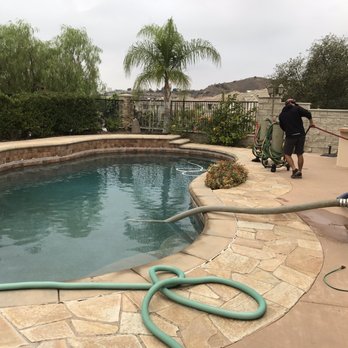 Sol Pool Tile Cleaning - First drain enough water to reveal the whole area that needs to clean. Those are two tanks of mineral powder Luis is rolling in. - Pool Cleaners Near Me Sol Pool Tile Cleaning - First drain enough water to reveal the whole area that needs to clean. Those are two tanks of mineral powder Luis is rolling in. - Pool Cleaners Near Me
