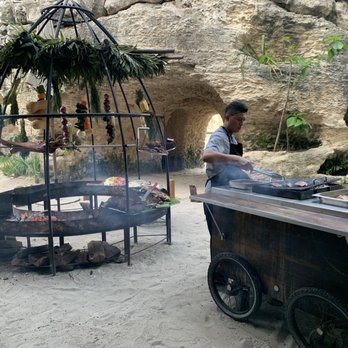 Las Cuevas - Outdoor grill towards the back. You can order different cuts of meat here - Steakhouses Near Me - Playa del Carmen, ROO