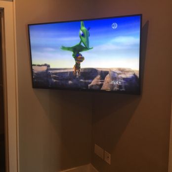 Rum AV Solutions - The cable and Xbox are mounted and hidden behind the tv. All wires are hidden. We have a 55' tv and are so happen with his work! - Home Theatre Installation Near Me - Ashburn, Virginia