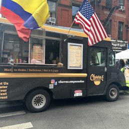 a food truck with an american flag a food truck with an american flag