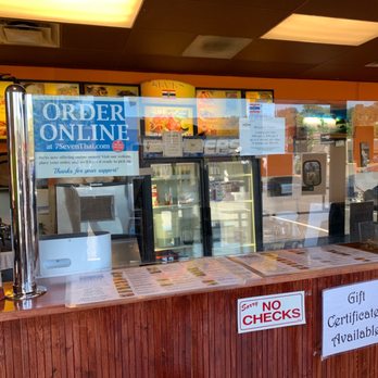 7 Seven Thai Restaurant - a restaurant counter with a sign on it - Thai Near Me - Roseburg, Oregon 7 Seven Thai Restaurant - a restaurant counter with a sign on it - Thai Near Me - Roseburg, Oregon