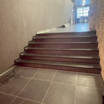 All Better Tile - Night club slab stairs and tile floors. - Tiling Near Me