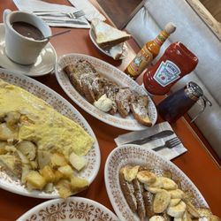 Andy's Diner - ham & cheese omelet w potatoes, raisin bread french toast, banana french toast, plain waffle.