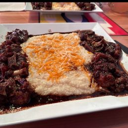 Ox tails and grits Ox tails and grits