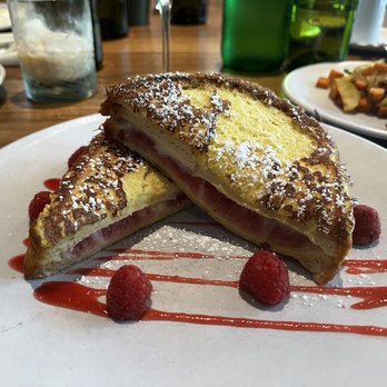 Fresko - Mascarpone cheese and raspberry stuffed French Toast. - New American Near Me - Des Moines, Iowa Fresko - Mascarpone cheese and raspberry stuffed French Toast. - New American Near Me - Des Moines, Iowa