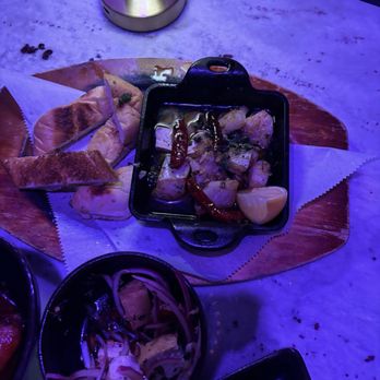 Tiki On 18th - some kind of fish in chili oil with cut up bread bottom: tokwa tofu - Tiki Bars Near Me - Washington, DC, District of Columbia Tiki On 18th - some kind of fish in chili oil with cut up bread bottom: tokwa tofu - Tiki Bars Near Me - Washington, DC, District of Columbia