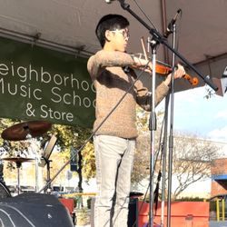 Neighborhood Music School & Store - Caleb performs at the Arcadia Holiday Fair on our main stage.