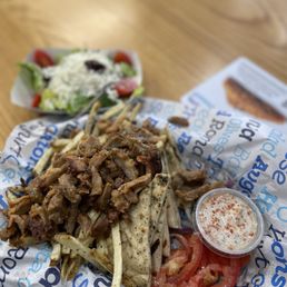 Pork belly gyro with fries Pork belly gyro with fries