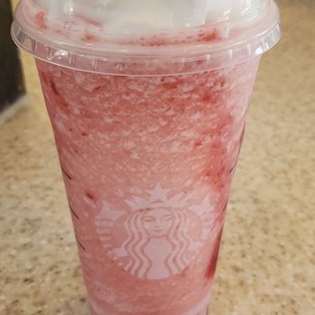 Starbucks - Venti pineapple passionfruit, 4 pumps raspberry,extra strawberry puree, blended,with whipped cream - Coffee & Tea Near Me - Edmond, Oklahoma
