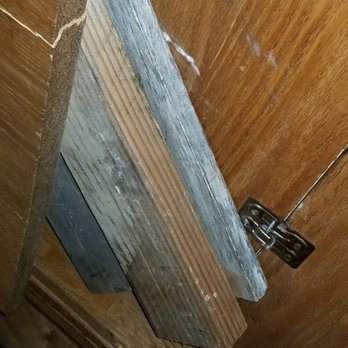 Bald Eagle Movers - 2 by 4 holding our table after the movers broke it and did not have the integrity to notify us. - Movers Near Me