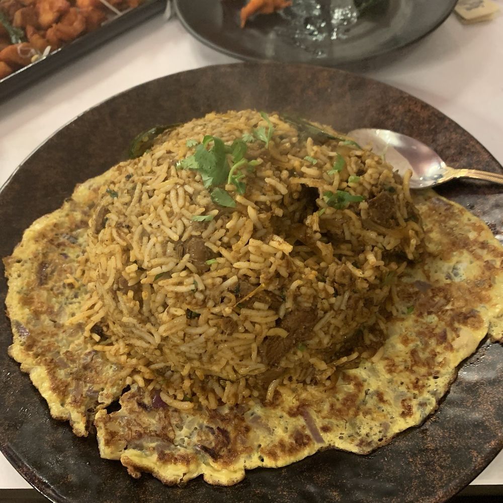 Suvai - Satti Soru - heap of Biriyani came on top of omelette - Indian Near Me - San Rafael, California Suvai - Satti Soru - heap of Biriyani came on top of omelette - Indian Near Me - San Rafael, California