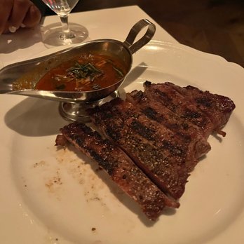 Carbone - Ribeye Diana - sauce on the side.  10/10 delicious and tender - Italian Near Me - Las Vegas, Nevada