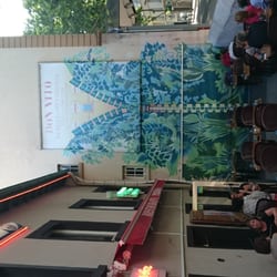 Don Vito - Terrasse au mur peint. Agréable le soir car elle est à l' ombre.