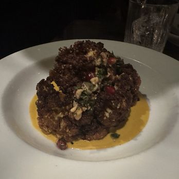Herb & Wood - Roasted Cauliflower, Garlic, Mama Lil-s Peppers, Smoked Almond Romesco - New American Near Me - San Diego, California Herb & Wood - Roasted Cauliflower, Garlic, Mama Lil-s Peppers, Smoked Almond Romesco - New American Near Me - San Diego, California