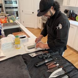 Rhythm & Spice - Chef Kendall sharpening his knives before prep.