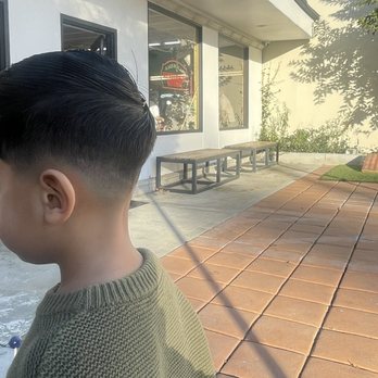American Barbershop - Mid fade , trim on top , by Edward - Barbers Near Me - Orange, California