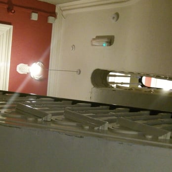 Vagabonds - Cool view of the stairwell looking up.. cool wrought iron work for railings! - Hostels Near Me - Belfast, BFS