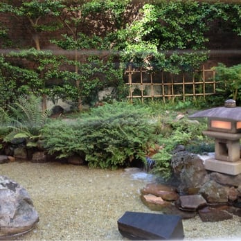 Tetsuya's - Japanese garden in the courtyard of Tetsuya (through the blinds, hence the lines) - French Near Me - Sydney, NSW