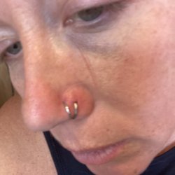Alley Katz Tattoo Gallery - Ring that was too tight