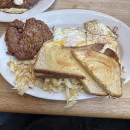 2 eggs, sausage, sourdough toast and potato noodles(well that's what they look like).