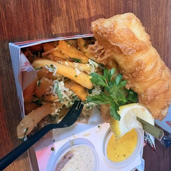 Gordon Ramsay Fish & Chips - Fish and chips with #2 Dirty Fries. Tartar sauce and Mango Curry sauce - Comfort Food Near Me - Las Vegas, Nevada Gordon Ramsay Fish & Chips - Fish and chips with #2 Dirty Fries. Tartar sauce and Mango Curry sauce - Comfort Food Near Me - Las Vegas, Nevada