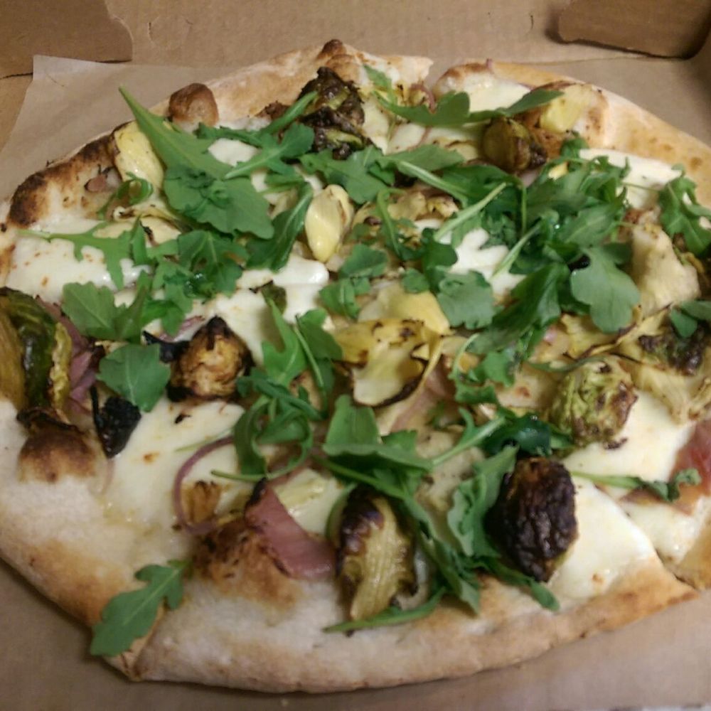 BYO - Garlic sauce, mozzarella, roasted artichokes and Brussels sprouts, caramelized onions, arugula, lemon oil BYO - Garlic sauce, mozzarella, roasted artichokes and Brussels sprouts, caramelized onions, arugula, lemon oil