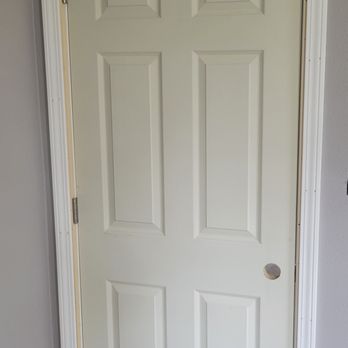 Guts to Glory - a white door in a room - General Contractors Near Me
