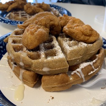 The Waffle Den - Chicken Strips, over a gingerbread waffle, over a Bacon and Bourbon Waffle - Waffles Near Me - Killeen, Texas The Waffle Den - Chicken Strips, over a gingerbread waffle, over a Bacon and Bourbon Waffle - Waffles Near Me - Killeen, Texas