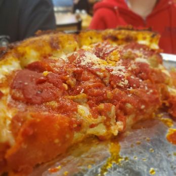 Pizza Ed - a slice taken out of a deep dish pizza - Pizza Near Me - Guntersville, Alabama Pizza Ed - a slice taken out of a deep dish pizza - Pizza Near Me - Guntersville, Alabama