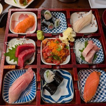 TheKoi Sushi and Sake Bar - Ranier Bento Box with bluefin tuna, salmon, wild sockeye salmon, yellowtail, chutoro. toro salmon, yellowtail roll & tuna poke. - Japanese Near Me - Tacoma, Washington TheKoi Sushi and Sake Bar - Ranier Bento Box with bluefin tuna, salmon, wild sockeye salmon, yellowtail, chutoro. toro salmon, yellowtail roll & tuna poke. - Japanese Near Me - Tacoma, Washington