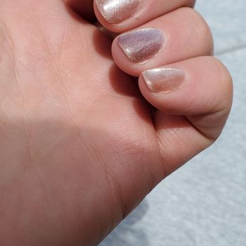 Mani Pedi Nail Salon - Asked for ring finger nail to be redone after finding black spots in it. Redo looks awful and like another color with green sparkles. - Nail Salons Near Me - Denver, Colorado Mani Pedi Nail Salon - Asked for ring finger nail to be redone after finding black spots in it. Redo looks awful and like another color with green sparkles. - Nail Salons Near Me - Denver, Colorado