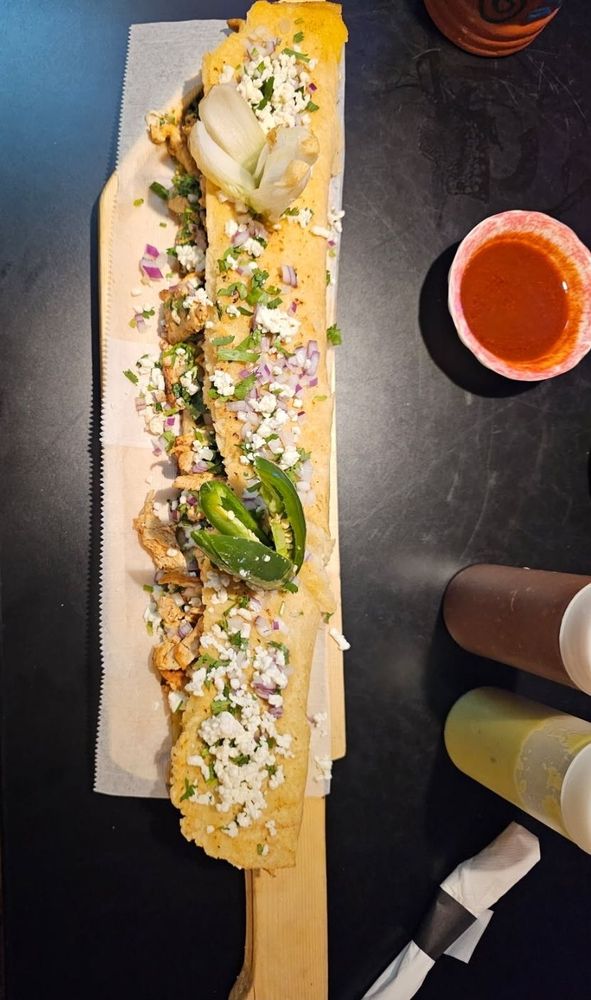 Taquero Mucho 2 Logo