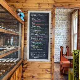 Menu, some of the seating, cupcake display