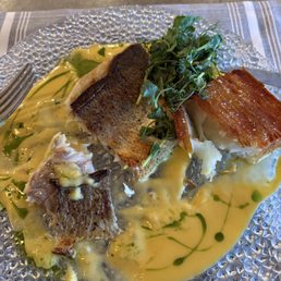 Branzino after a couple of bites. Delicious. Branzino after a couple of bites. Delicious.