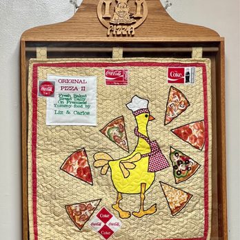 Original Pizza II - a chicken in a chef's hat - Pizza Near Me - Pinellas Park, Florida