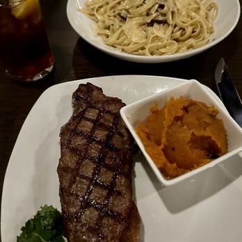 Stonewalls - NY Strip, maple mashed sweet potatoes, and mushroom pasta. - Steakhouses Near Me - Banner Elk, North Carolina Stonewalls - NY Strip, maple mashed sweet potatoes, and mushroom pasta. - Steakhouses Near Me - Banner Elk, North Carolina
