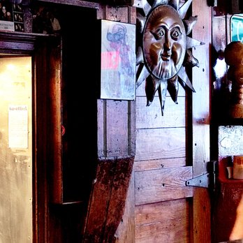 Hammerheads - a bar with a sun face on the wall - Southern Near Me - Louisville, Kentucky Hammerheads - a bar with a sun face on the wall - Southern Near Me - Louisville, Kentucky