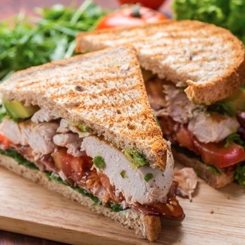 Green Point - a cut in half sandwich on a cutting board - American Near Me - River Vale, New Jersey Green Point - a cut in half sandwich on a cutting board - American Near Me - River Vale, New Jersey