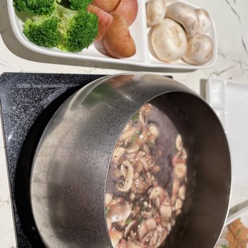 The Melting Pot - Coq Au Vin - Fondue Near Me - Chesterfield, Missouri